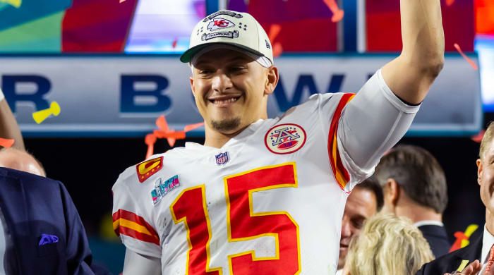 Kansas City Chiefs quarterback Patrick Mahomes (15) celebrates with the Vince Lombardi Trophy after defeating the Philadelphia Eagles during Super Bowl LVII at State Farm Stadium.
